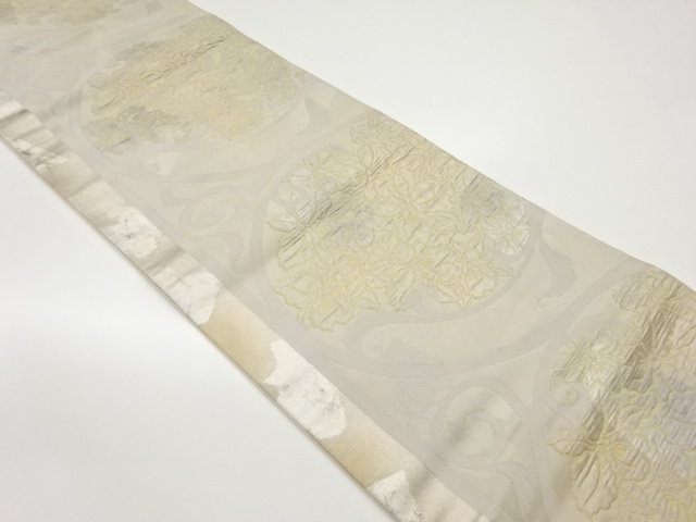 ふくれ織引箔椿唐草模様織出し袋帯